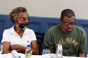 A man and woman sitting at a table.