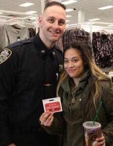 A man and woman posing for the camera.