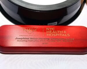 A red box with the words nyc health & hospitals on it.