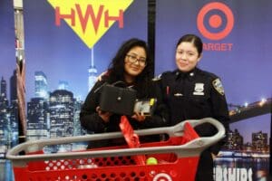 Two women in uniform are posing for a picture.